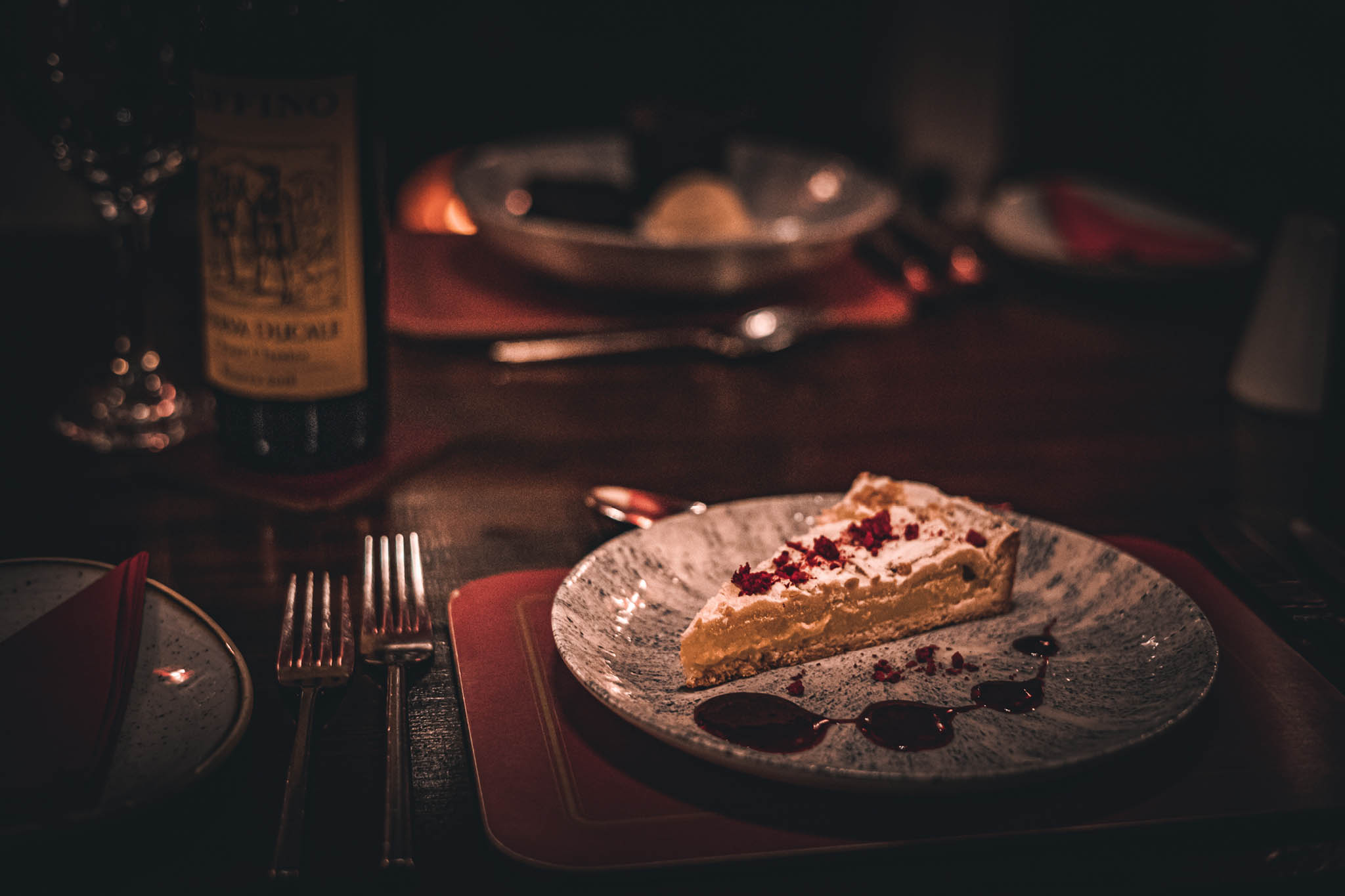 A delicious dessert served with a fine red wine